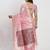 Light pink linen saree with multicolor weaving and zari pallu