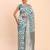 cream linen cotton saree with sky blue pallu and contrast blouse piece