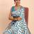 cream linen cotton saree with sky blue pallu and contrast blouse piece
