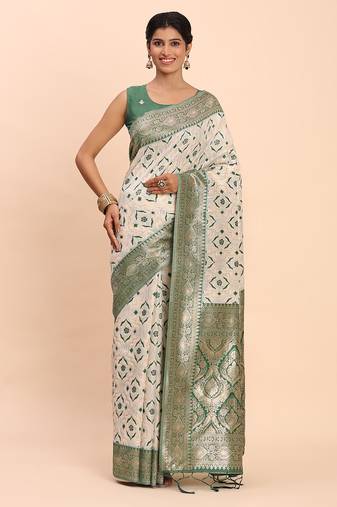 cream linen cotton saree with green pallu and contrast blouse piece