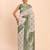 cream linen cotton saree with green pallu and contrast blouse piece