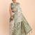 cream linen cotton saree with green pallu and contrast blouse piece