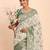 cream linen cotton saree with green pallu and contrast blouse piece
