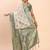 cream linen cotton saree with green pallu and contrast blouse piece