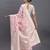 cream linen cotton saree with light pink pallu and contrast blouse piece