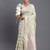 cream linen cotton saree with light green pallu and contrast blouse piece