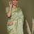light green cotton saree with golden zari work