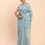 Sky blue linen cotton saree with silver zari weave and tassels