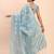 Sky blue linen cotton saree with silver zari weave and tassels