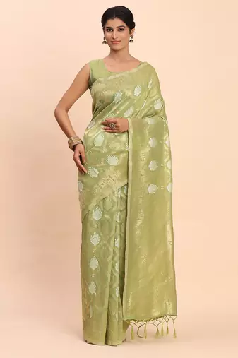 Light green linen cotton saree with silver zari weave and tassels