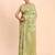 Light green linen cotton saree with silver zari weave and tassels