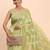 Light green linen cotton saree with silver zari weave and tassels