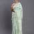 Sea green linen cotton saree with silver zari weave and tassels