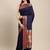 navy blue party wear saree with rich pallu and contrast zari border