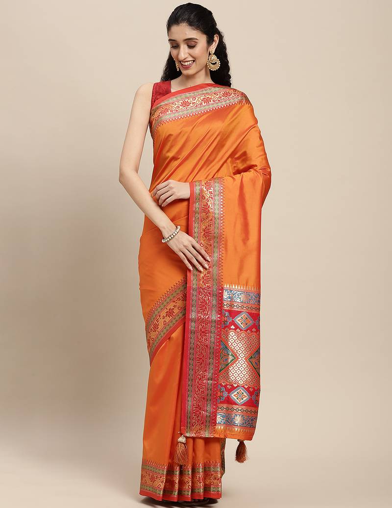orange party wear saree with rich pallu and contrast zari border