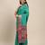 sea green party wear saree with rich pallu and contrast zari border