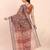 Brown cotton saree with tribal floral print 