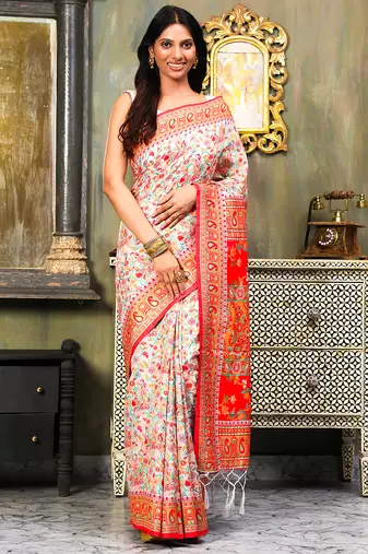 Graceful woven linen cotton saree with intricate traditional patterns and tassel sari