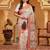 woven linen cotton saree with intricate patterns and tassel