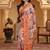 woven linen cotton saree with intricate patterns and tassel