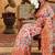 woven linen cotton saree with intricate patterns and tassel