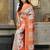woven linen cotton saree with intricate patterns and tassel
