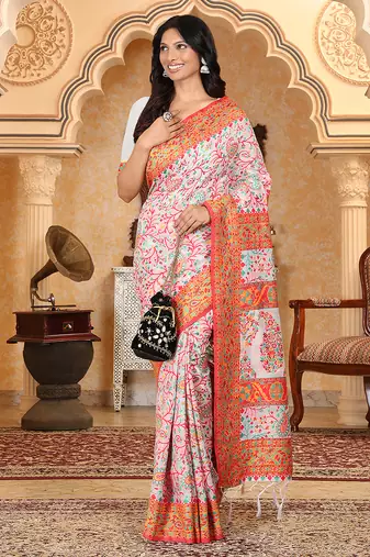 woven linen cotton saree with intricate patterns and tassel