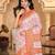 woven linen cotton saree with intricate patterns and tassel
