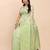 Beige light green banarasi cotton saree with floral zari work