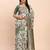 off-white green linen cotton saree with zari woven border