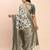 off-white green linen cotton saree with zari woven border