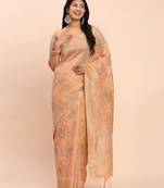 Elegant orange linen cotton saree with floral weave & soft gold pallu graceful choice for casual, office & festive looks