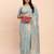 light blue floral weave linen cotton saree with soft gold pallu