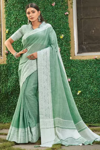 Sea green linen cotton saree with intricate woven border contrast pallu