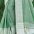 Sea green linen cotton saree with intricate woven border contrast pallu