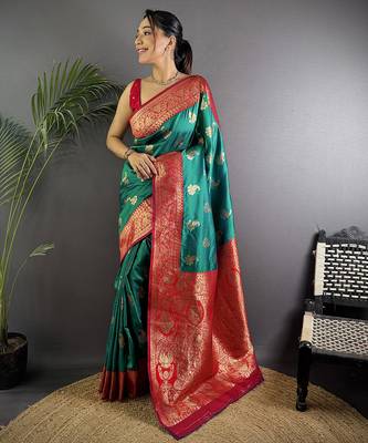 Green silk blend woven butta weaving banarasi saree with zari border 1