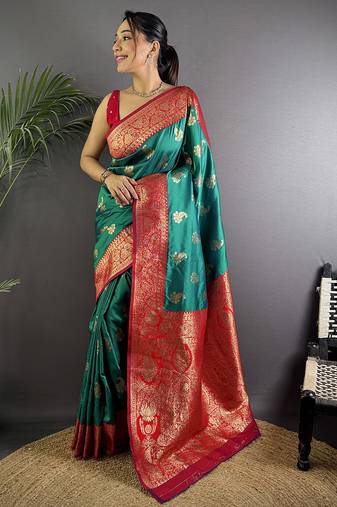 Green silk blend woven butta weaving banarasi saree with zari border