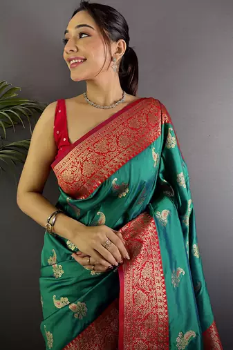 Green silk blend woven butta weaving banarasi saree with zari border