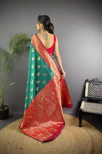 Green silk blend woven butta weaving banarasi saree with zari border