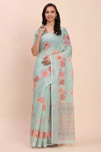 Sea green cotton cotton saree with tribal floral print