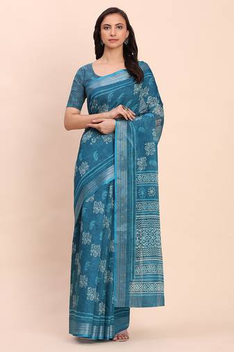 Sea green cotton cotton saree with tribal floral print