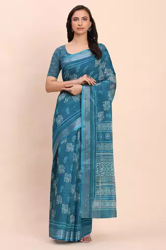 Sea green cotton cotton saree with tribal floral print