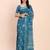 Sea green cotton cotton saree with tribal floral print