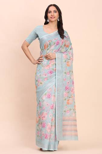 Sea green cotton cotton saree with tribal floral print