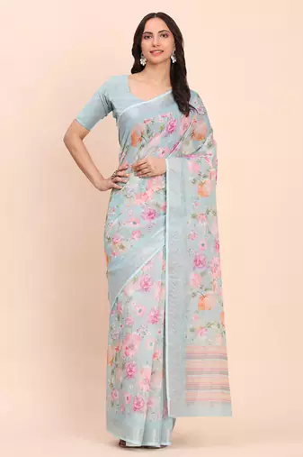 Sea green cotton cotton saree with tribal floral print