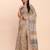 cream beige linen cotton floral print zari border saree with blouse
