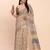 cream beige linen cotton floral print zari border saree with blouse