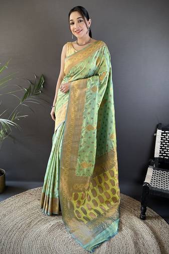 Light green silk blend copper zari weaving banarasi saree with contrast blouse