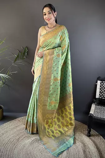Light green silk blend copper zari weaving banarasi saree with contrast blouse