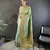Light green silk blend copper zari weaving banarasi saree with contrast blouse